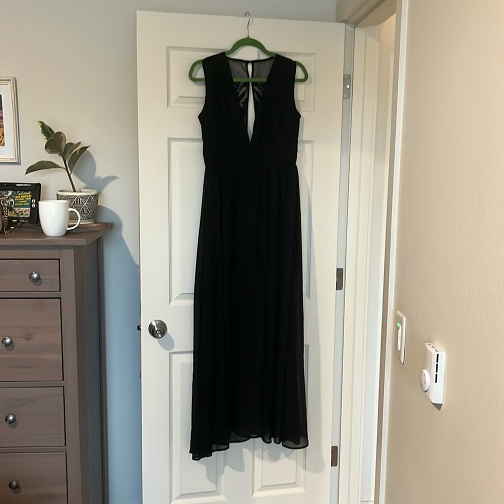 No name brand, but not used often. Black dress. Medium size.